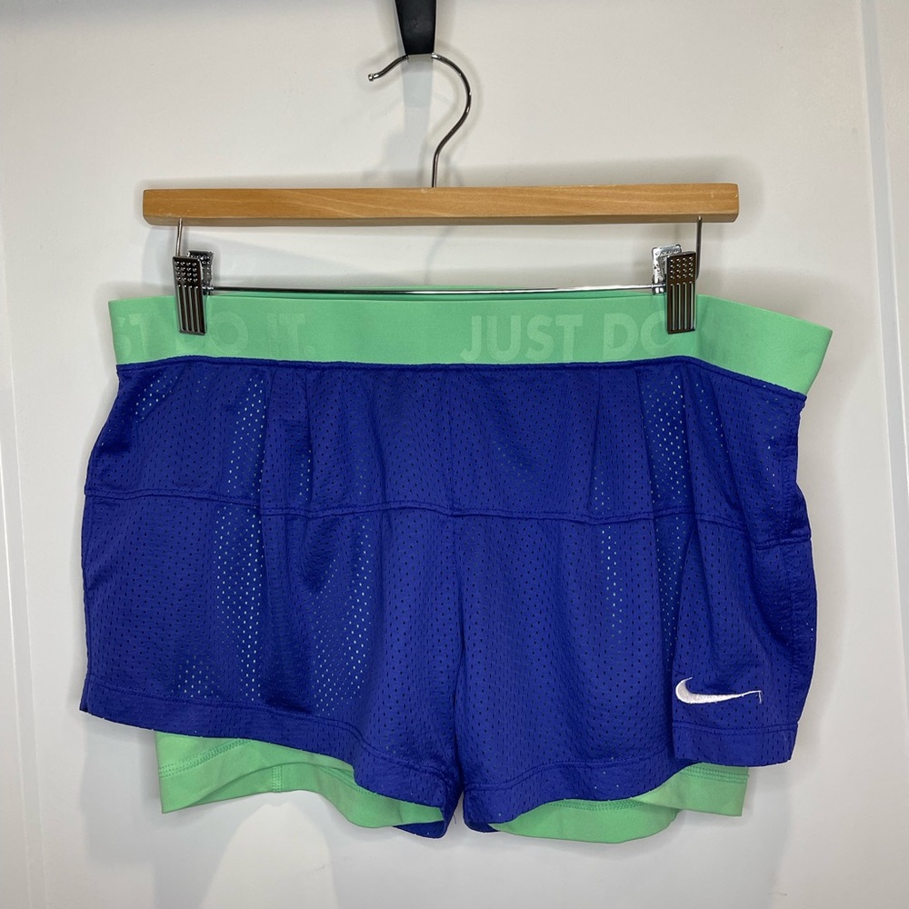 Nike dri-fit running shorts Woman’s size large green and blue